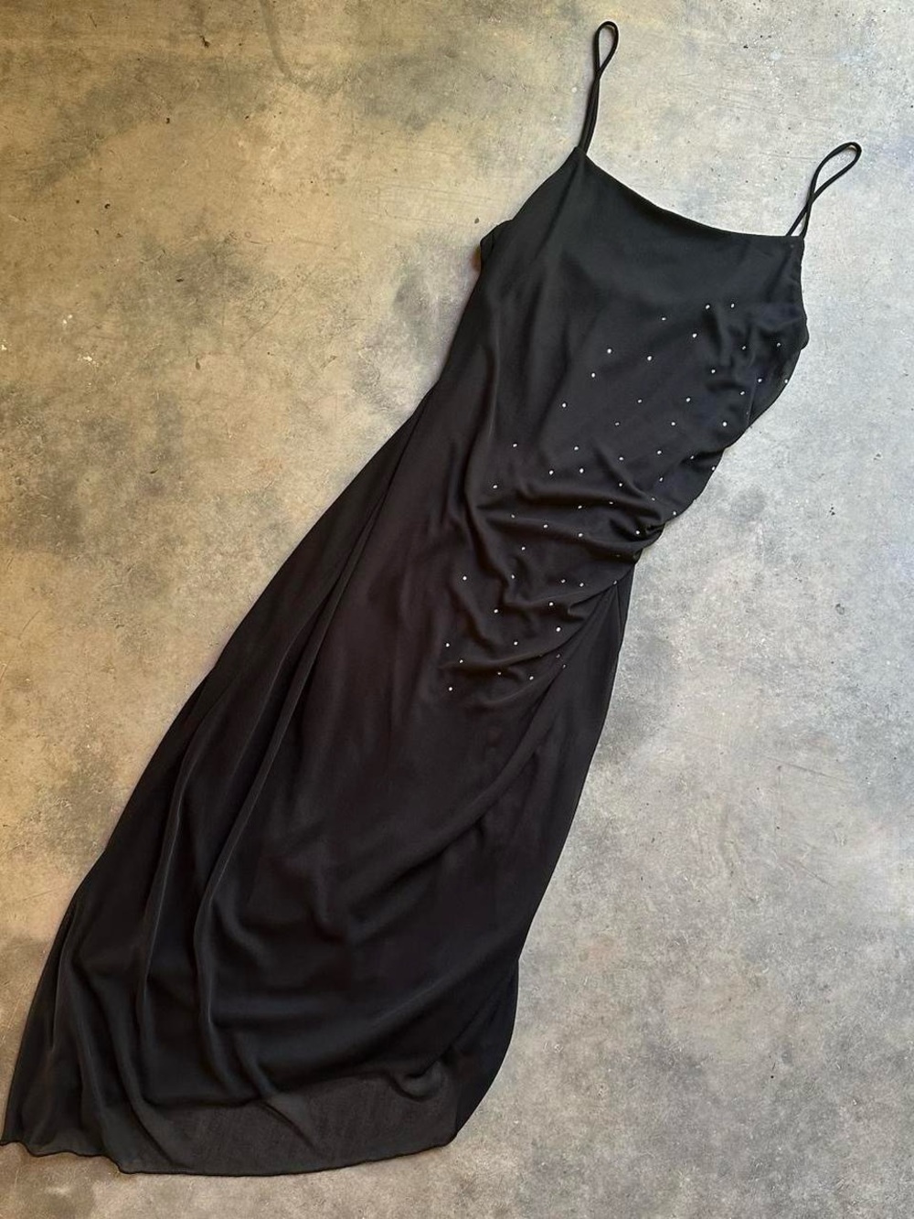 Black midi dress with ruched waist and rhinestone details